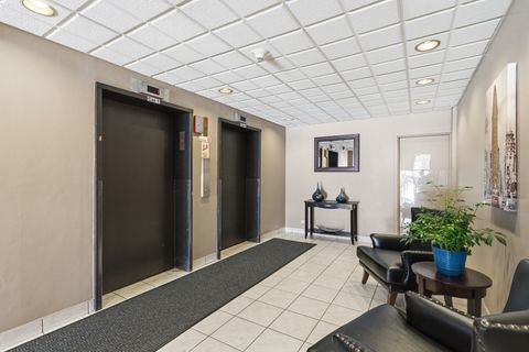 Tiny photo for 720 Wellington Avenue #405, Elk Grove Village, IL 60007 (MLS # 12589035)