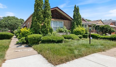 Photo of 8733 S Ridgeland Avenue, Chicago, IL 60617 (MLS # 12705506)