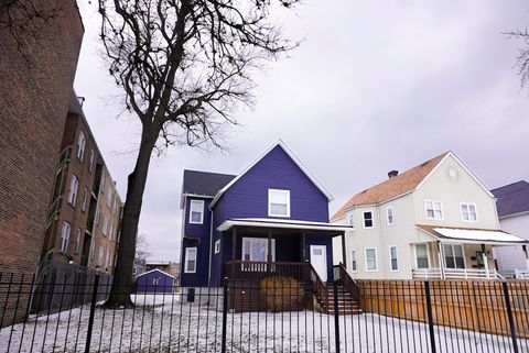 Photo of 320 N Menard Avenue, Chicago, IL 60644 (MLS # 12554038)