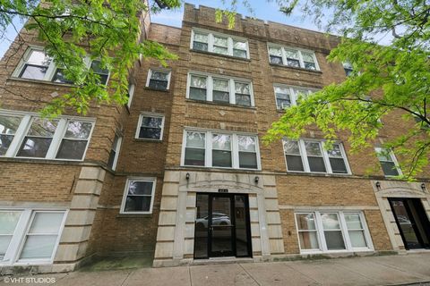 Photo of 3849 W Ainslie Street #1, Chicago, IL 60625 (MLS # 12474324)