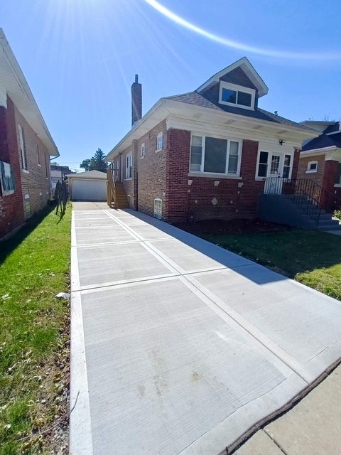 Photo of 1413 W 97th Street, Chicago, IL 60643 (MLS # 12780118)