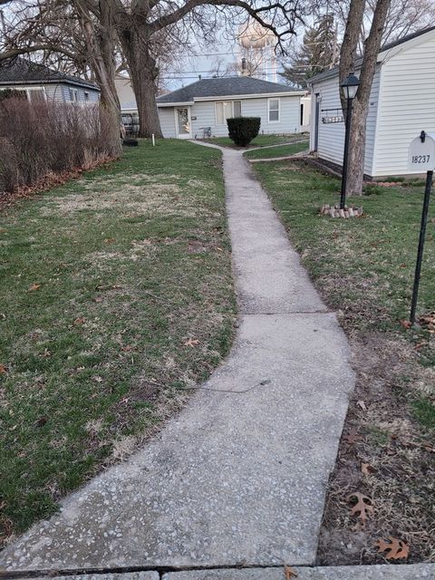 Tiny photo for 18237 Oakwood Avenue, Lansing, IL 60438 (MLS # 12602668)