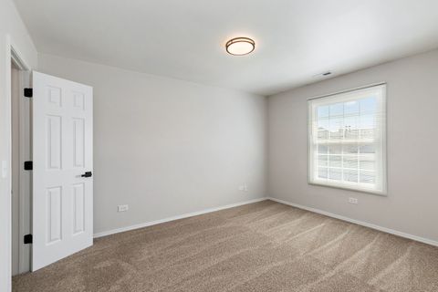 Tiny photo for 628 Mallard Court #B2, Bartlett, IL 60103 (MLS # 12615490)