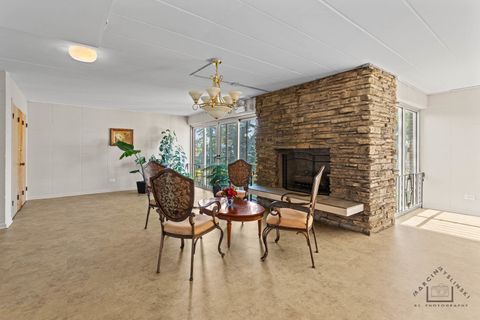 Tiny photo for 127 N Wolf Road #53B, Wheeling, IL 60090 (MLS # 12465636)