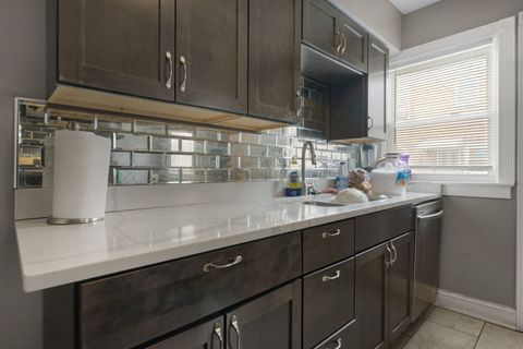 Tiny photo for 1028 BELLWOOD Avenue #E, Bellwood, IL 60104 (MLS # 12571598)