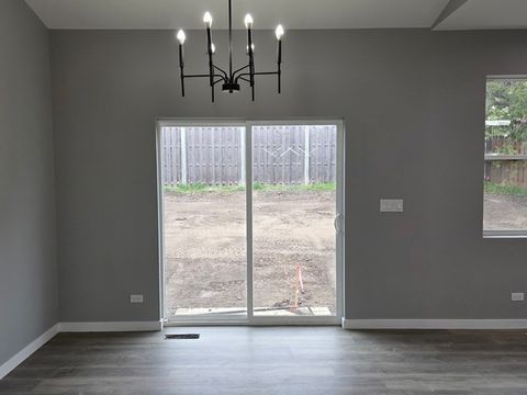 Tiny photo for 1390 Merrimac Lane, Hanover Park, IL 60133 (MLS # 12471684)