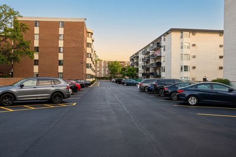 Tiny photo for 5500 Lincoln Avenue #510-E, Morton Grove, IL 60053 (MLS # 12615444)