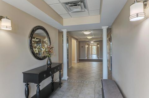 Tiny photo for 601 W Rand Road #106, Arlington Heights, IL 60004 (MLS # 12637241)