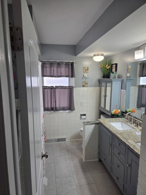Tiny photo for 1101 E Washington Boulevard, Lombard, IL 60148 (MLS # 12628138)