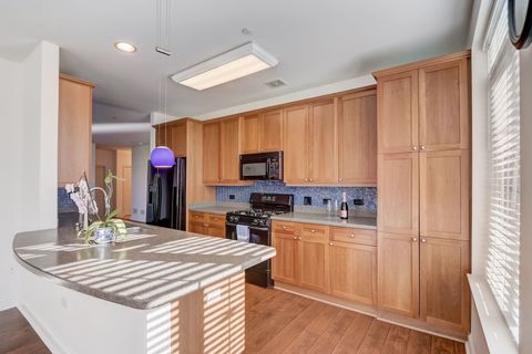 Tiny photo for 620 McHenry Road #104, Wheeling, IL 60090 (MLS # 12696214)