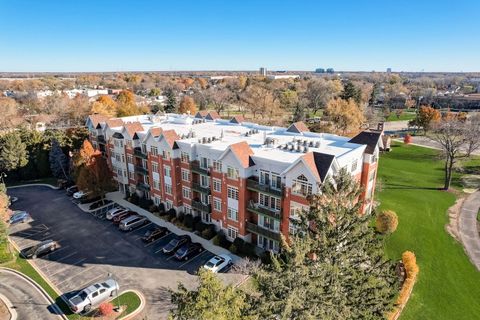 Photo of 620 McHenry Road #104, Wheeling, IL 60090 (MLS # 12696214)