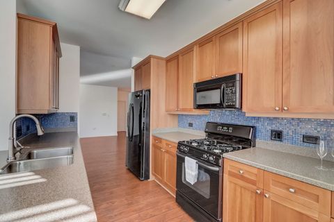 Tiny photo for 620 McHenry Road #104, Wheeling, IL 60090 (MLS # 12696214)