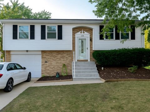 Photo of 108 VILLA Road, Streamwood, IL 60107 (MLS # 12491465)