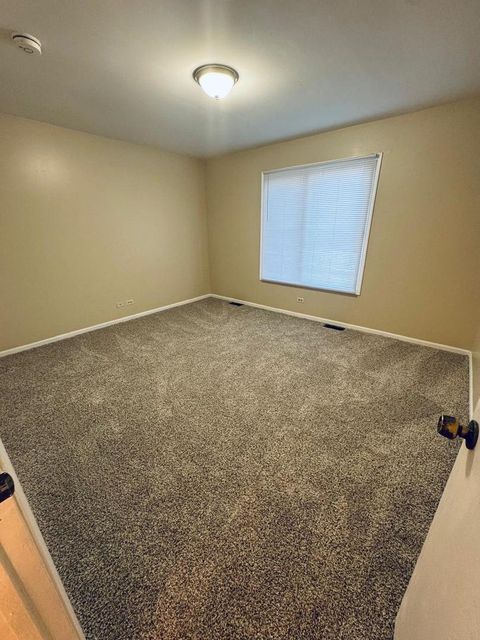 Tiny photo for 216 Iris Drive, Streamwood, IL 60107 (MLS # 12493832)