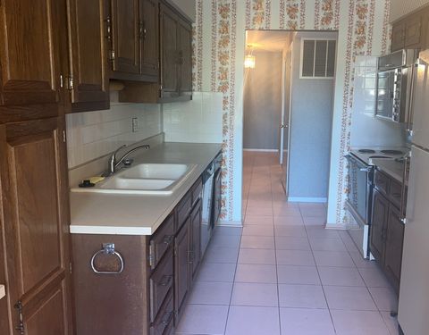 Tiny photo for 8101 W Courte Drive #D203, Niles, IL 60714 (MLS # 12456035)