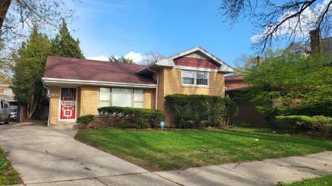 Photo of 7023 S Bennett Avenue, Chicago, IL 60649 (MLS # 12723009)