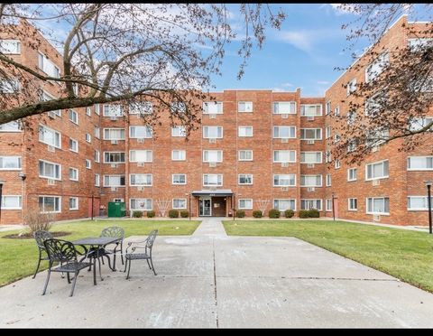 Photo of 222 Madison Street #208, Joliet, IL 60435 (MLS # 12490784)