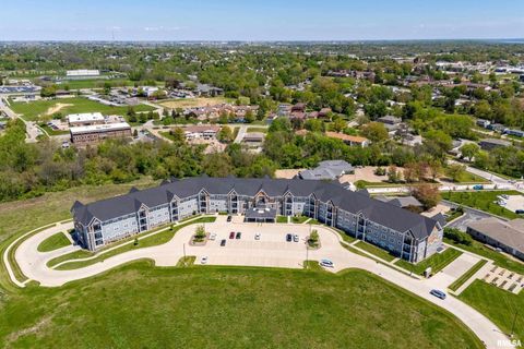 Photo of 2592 MIDDLE Road #103, Bettendorf, IA 52722 (MLS # QC4265628)