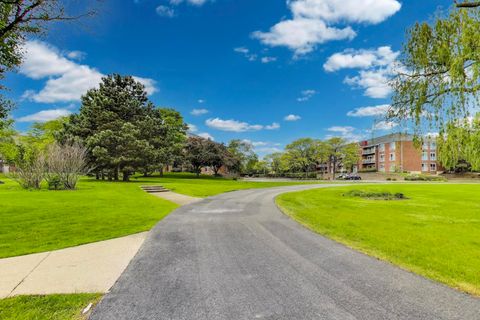 Tiny photo for 805 Leicester Road #B105, Elk Grove Village, IL 60007 (MLS # 12371452)