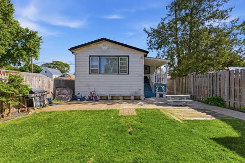 Photo of 3733 W 64th Street, Chicago, IL 60629 (MLS # 12684958)