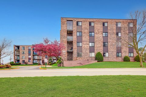 Photo of 625 W Huntington Commons Road #208, Mount Prospect, IL 60056 (MLS # 12618168)