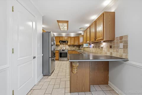 Tiny photo for 900 White Oak Drive, North Aurora, IL 60542 (MLS # 12725918)