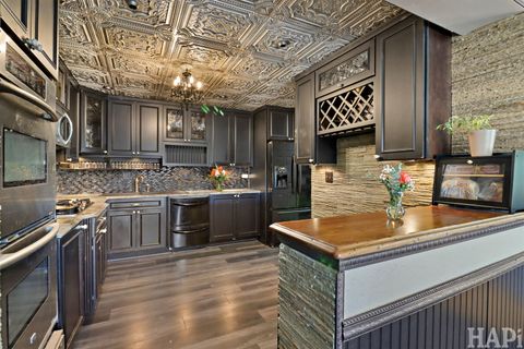 Tiny photo for 902 Huntington Drive #902, Elk Grove Village, IL 60007 (MLS # 12556042)