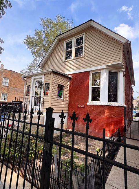 Photo of 1041 N RIDGEWAY Avenue, Chicago, IL 60651 (MLS # 12449497)