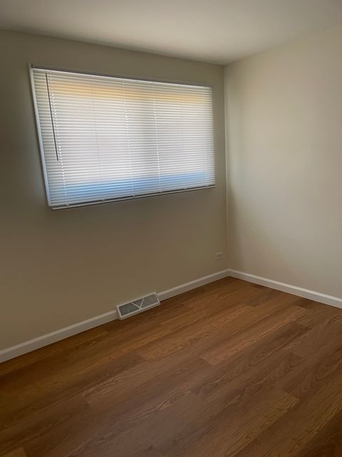 Tiny photo for 10059 Frontage Road #F, Skokie, IL 60077 (MLS # 12520708)