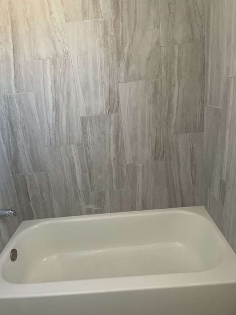 Tiny photo for 10059 Frontage Road #F, Skokie, IL 60077 (MLS # 12520708)