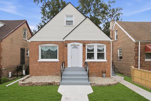 Photo of 433 W 100TH Street, Chicago, IL 60628 (MLS # 12736088)