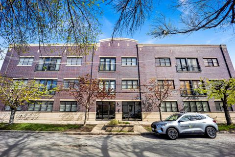Photo of 2310 W NELSON Street #102, Chicago, IL 60618 (MLS # 12627682)