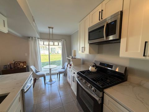 Tiny photo for 335 David Court #B, Bartlett, IL 60103 (MLS # 12563097)