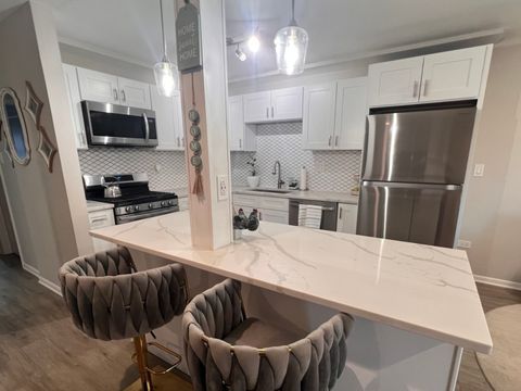 Tiny photo for 7125 OCONNELL Drive #102, Chicago Ridge, IL 60415 (MLS # 12491499)