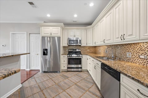 Tiny photo for 660 McHENRY Road #207, Wheeling, IL 60090 (MLS # 12767242)