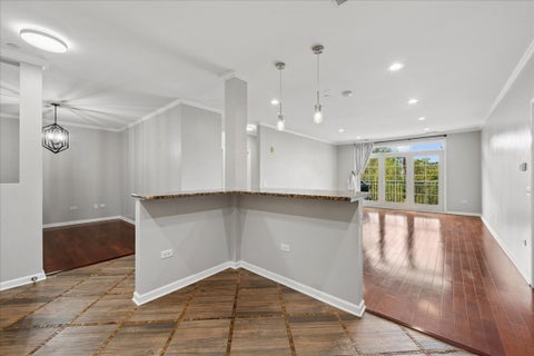 Tiny photo for 660 McHENRY Road #207, Wheeling, IL 60090 (MLS # 12767242)