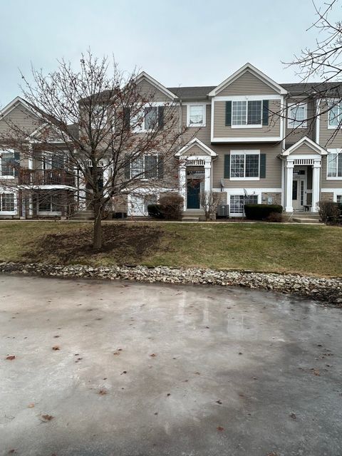 Photo of 103 Enclave Circle #C, Bolingbrook, IL 60440 (MLS # 12536728)
