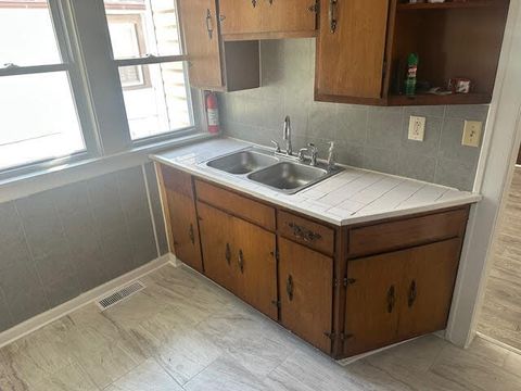 Tiny photo for 506 E 144th Place, Dolton, IL 60419 (MLS # 12470146)