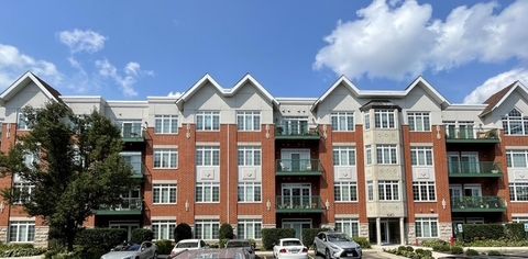 Photo of 640 Mchenry Road #408, Wheeling, IL 60090 (MLS # 12681396)
