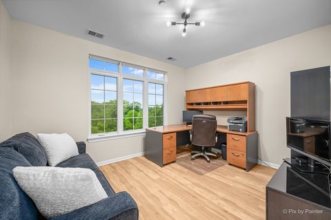 Tiny photo for 640 Mchenry Road #408, Wheeling, IL 60090 (MLS # 12681396)