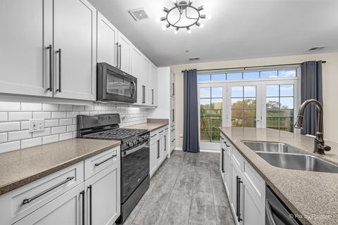 Tiny photo for 640 Mchenry Road #408, Wheeling, IL 60090 (MLS # 12681396)