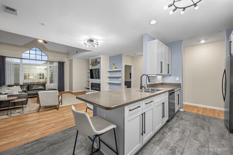 Tiny photo for 640 Mchenry Road #408, Wheeling, IL 60090 (MLS # 12681396)