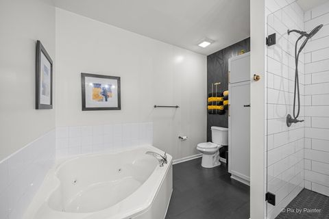 Tiny photo for 640 Mchenry Road #408, Wheeling, IL 60090 (MLS # 12681396)