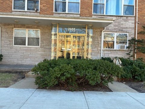 Photo of 2055 W Lunt Avenue #403, Chicago, IL 60645 (MLS # 12607426)