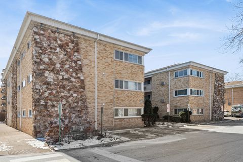 Photo of 7201 W Wellington Avenue #D-1, Elmwood Park, IL 60707 (MLS # 12598814)