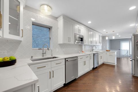 Tiny photo for 3123 W Chase Avenue, Chicago, IL 60645 (MLS # 12462929)