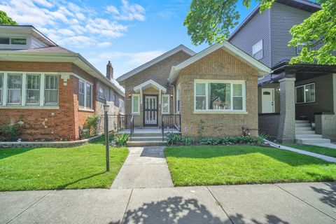Photo of 7707 S Ridgeland Avenue, Chicago, IL 60649 (MLS # 12660336)