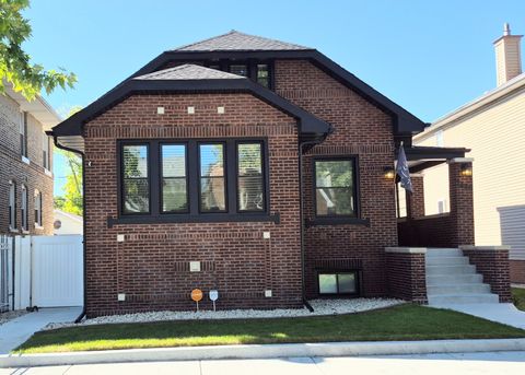 Photo of 7440 S Oglesby Avenue, Chicago, IL 60649 (MLS # 12491745)