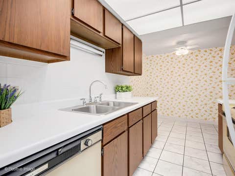 Tiny photo for 6340 AMERICANA Drive #216, Willowbrook, IL 60527 (MLS # 12648534)