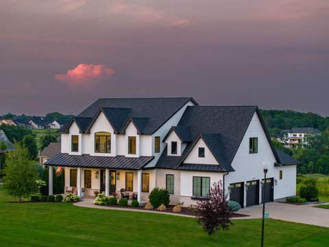 Photo of 5175 Pigeon Creek Trail, Bettendorf, IA 52722 (MLS # 12666501)